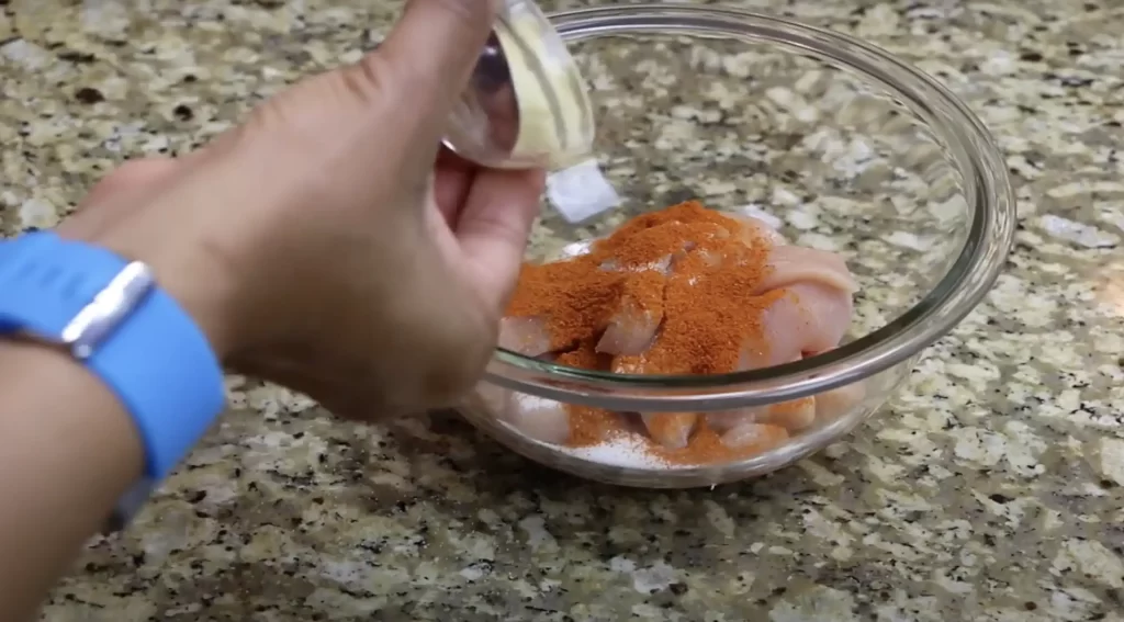 Seasoning the chicken for Butter Chicken 